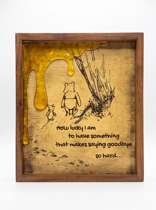 Winnie the Pooh and Piglet framed quote artwork with golden honey-drip details