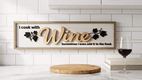 Handcrafted 3D wooden kitchen sign with 'I cook with wine' script and grapevine details, mounted on a white subway tile wall in a modern kitchen.