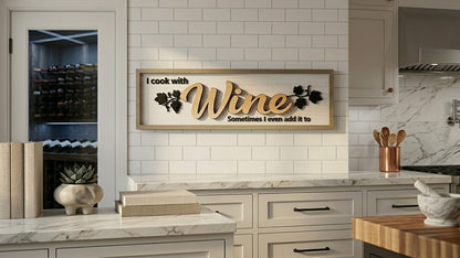 Close-up of layered wood lettering on the I Cook With Wine kitchen sign